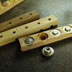 Holzleiste mit Inserts